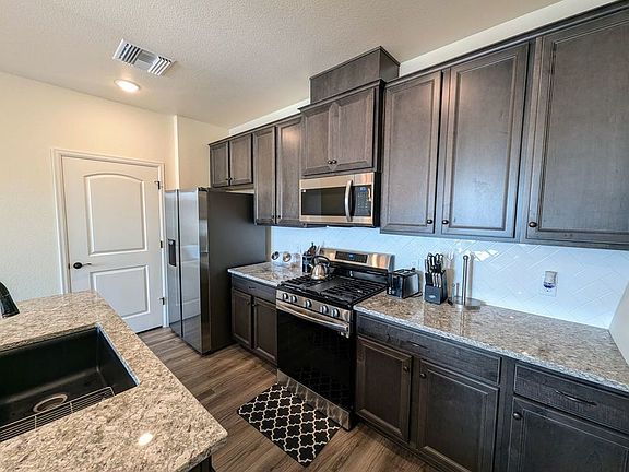 3rd image of 6153 N Ceylon St Unit 10208