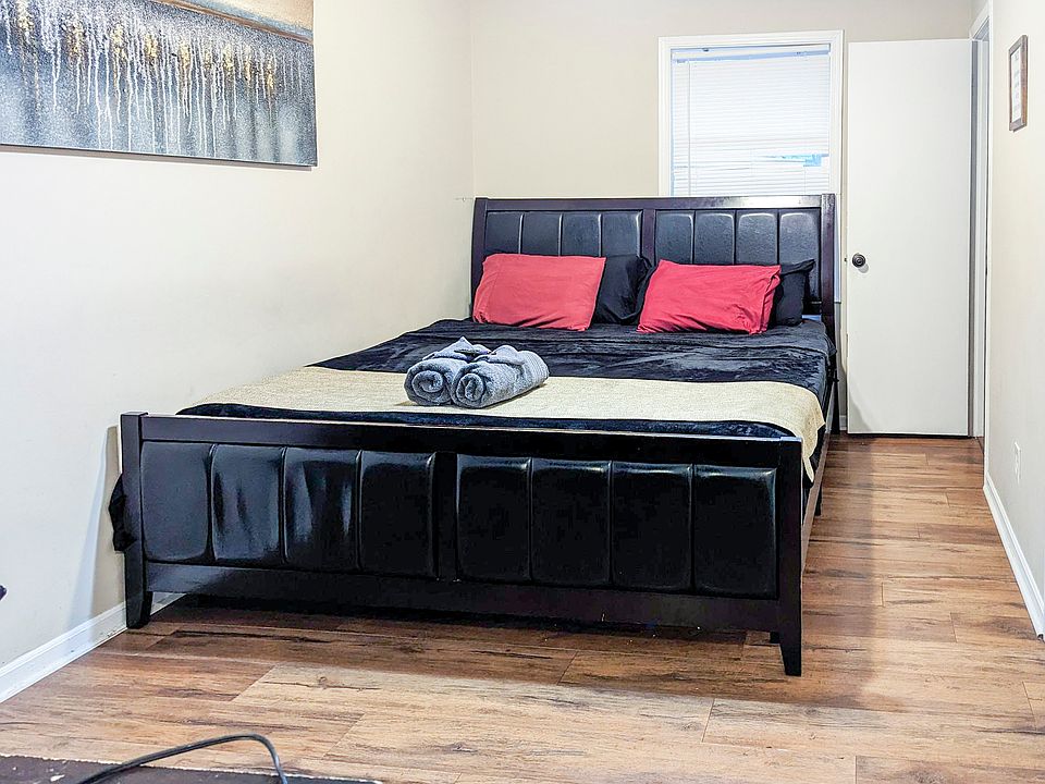 BR#1 king bed. door to 1/2 bathroom on the right hand side