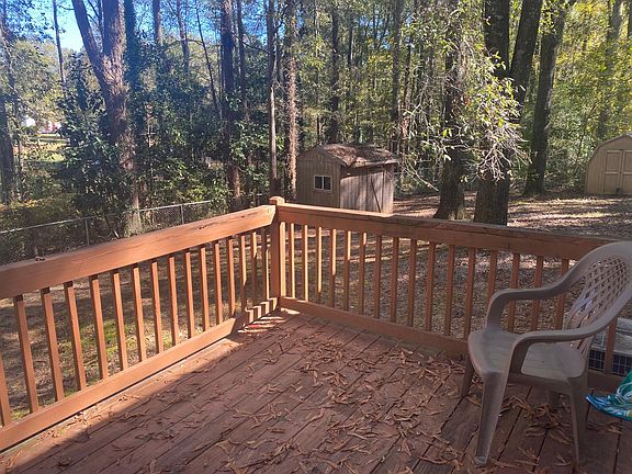 nice, sized deck over looks the large fenced in yard