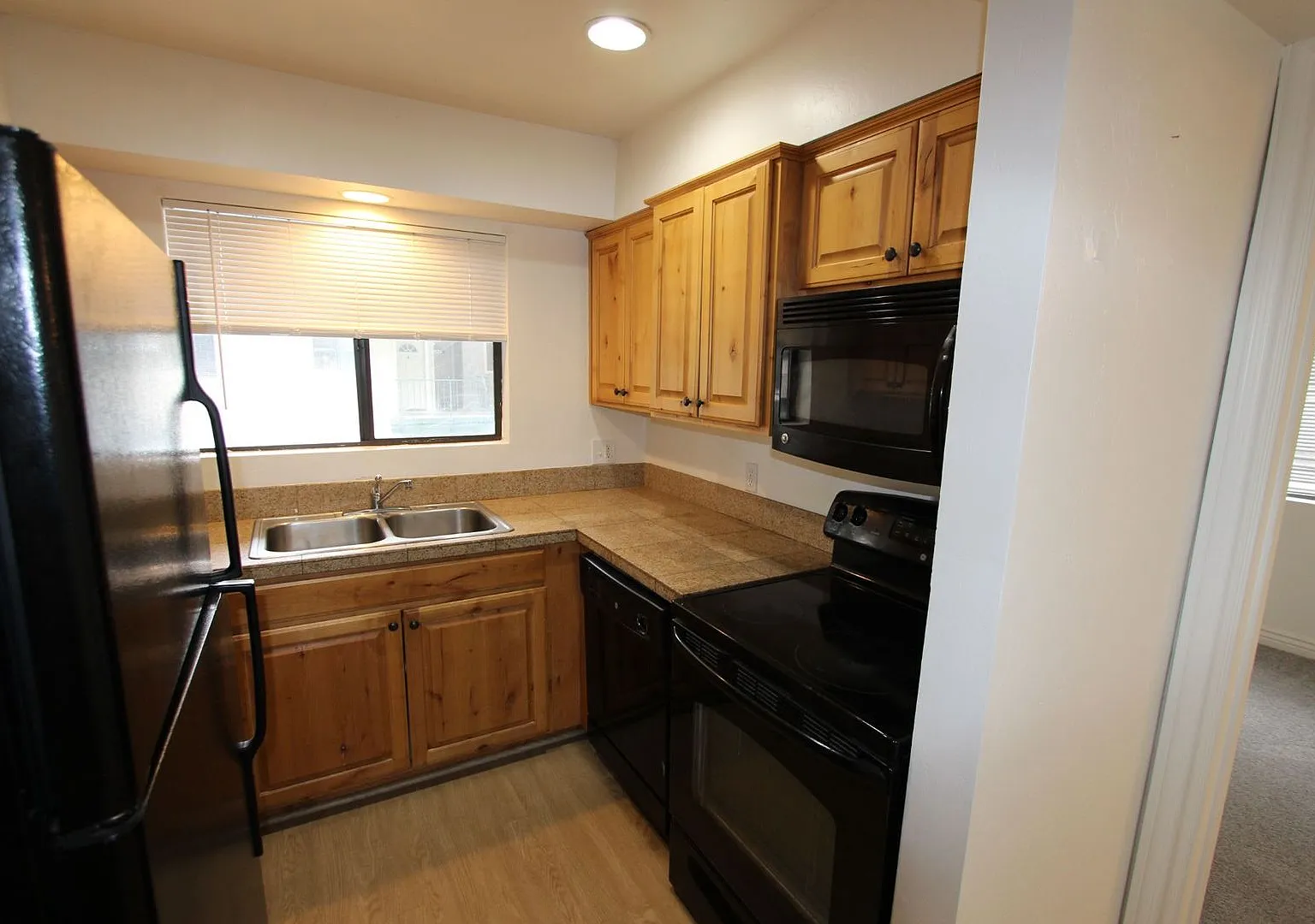 2-Bedroom Condo with Private Balcony in University Heights — Photo 2