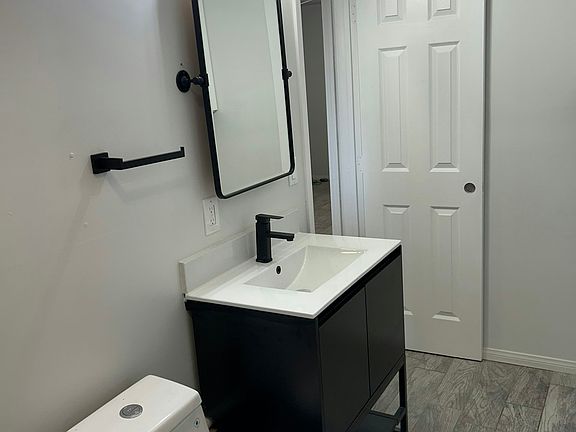 Bathroom vanity and mirror