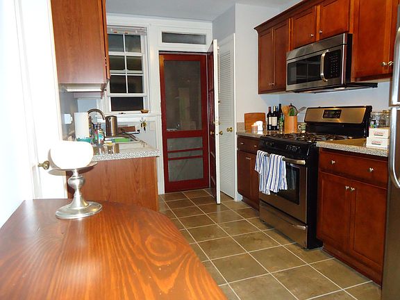 Kitchen, with door to back porch and stairs to the rear yard