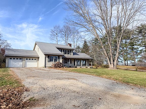 Two car garage with remotes. Room for parking several vehicles.
