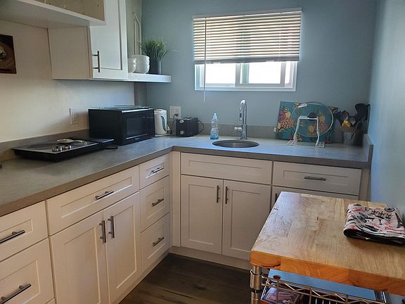 Kitchen fully stocked with dishes for your enjoyment