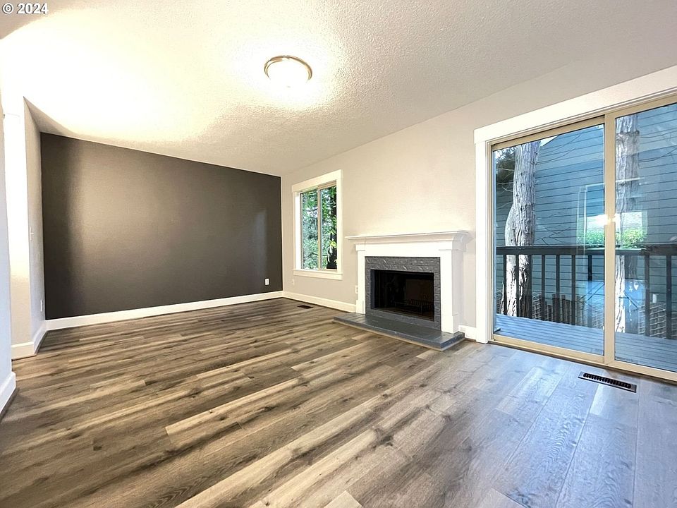 Unit 5 is mirror image of this (sliding glass door on other side) and has small fenced back yard.