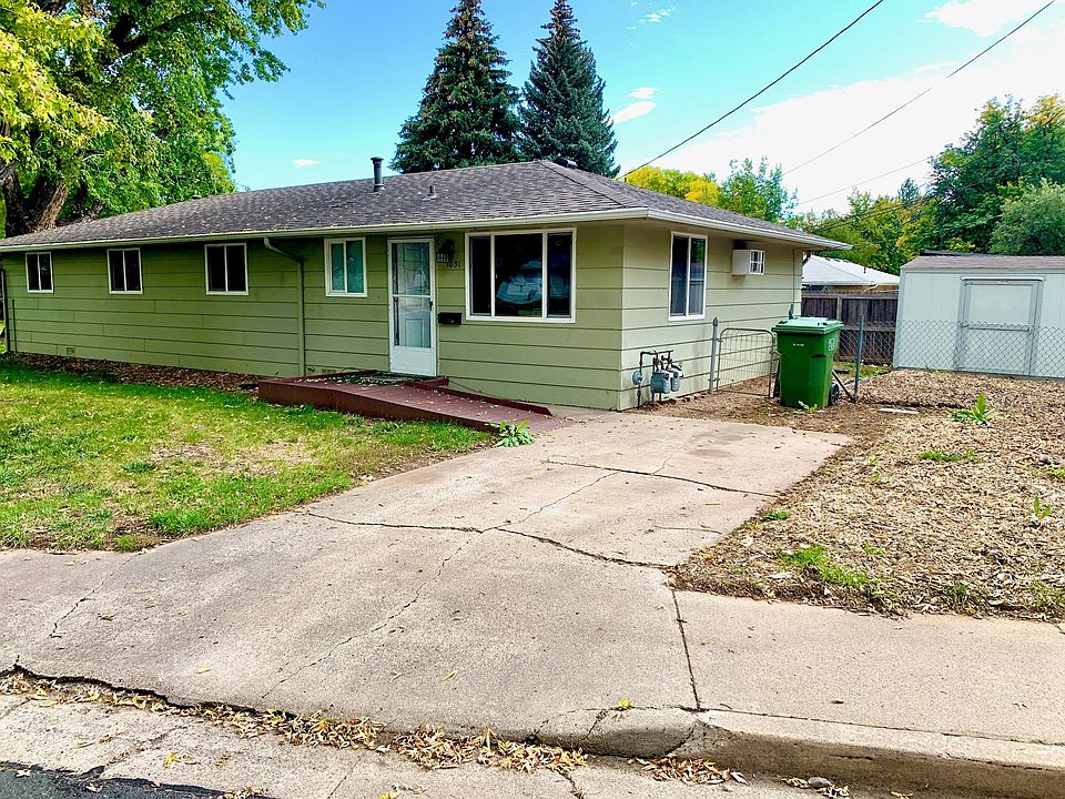 Front of home and parking area.