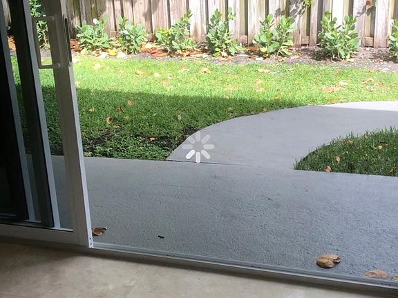 Hurricane windows and sliding glass doors everywhere.