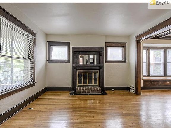 The delightful living room is just waiting for furniture.
