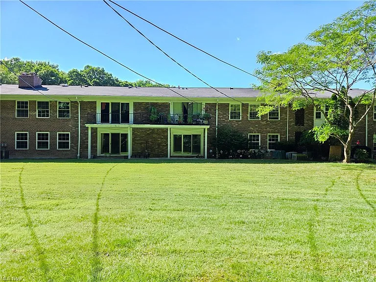 6960 Carriage Hill Dr #102 — Photo 1