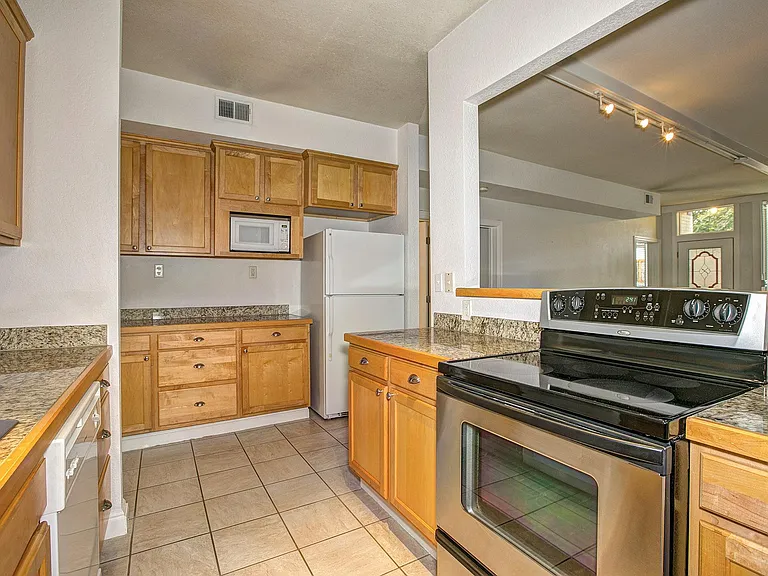 The countertops are new here, as well as the stove and refrigerator