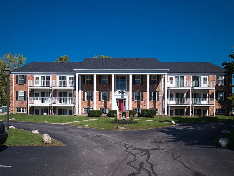 Live in style at University Hills Apartments with classic brick architecture and private balconies near the University of Toledo.