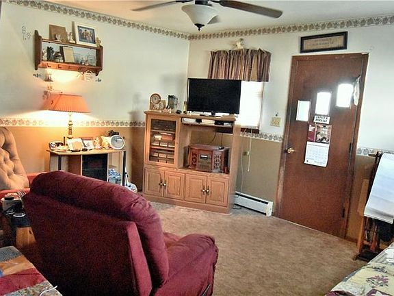 Entrance through the screened in porch to the living area.