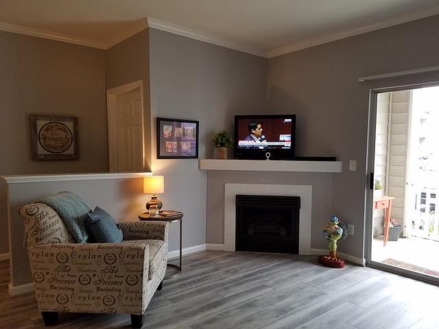 Living are looking at gas fireplace