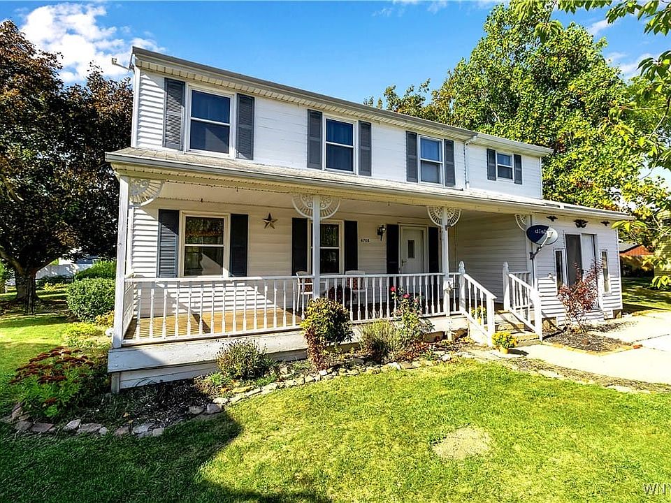 inviting front porch on lovely cul-de-sac