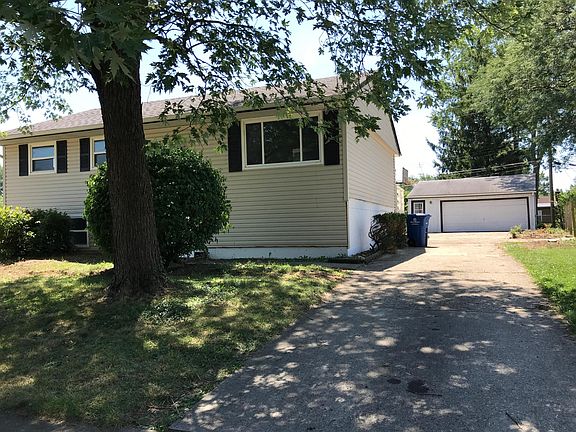 Large driveway and two-car garage