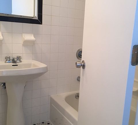 5th image of 317 E 9th St APT 7