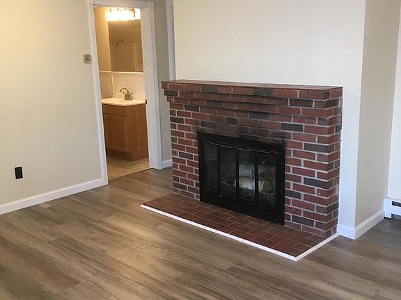 While non-working, the fireplace is a charming place to hang your Christmas stocking!