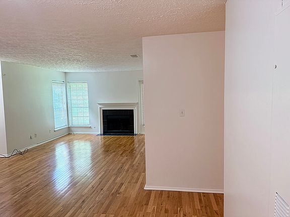 spacious living room with hardwood floors