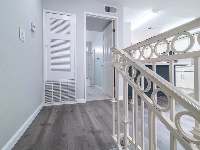 2nd floor entry to full bathroom, kitchen and living room