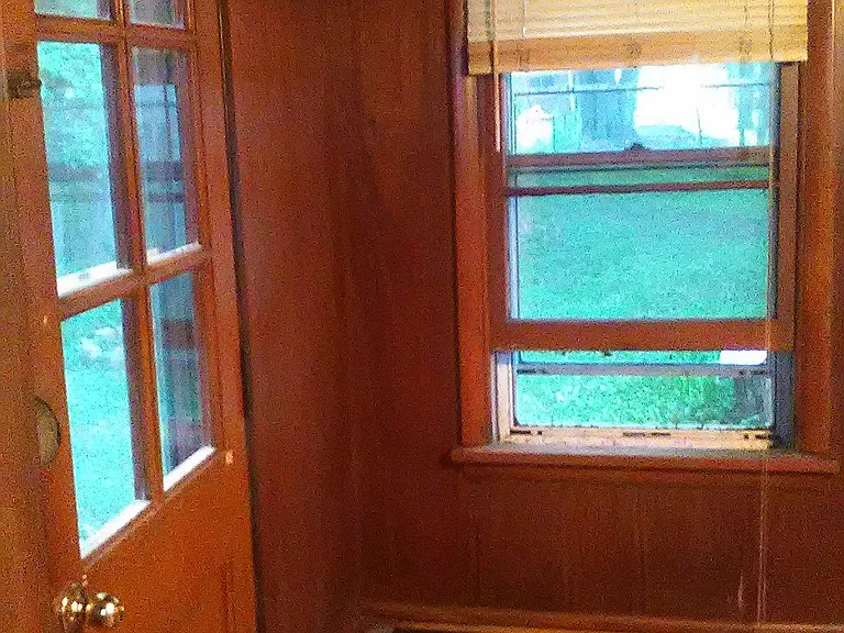 Entrance to Sunroom which faces the backyard.