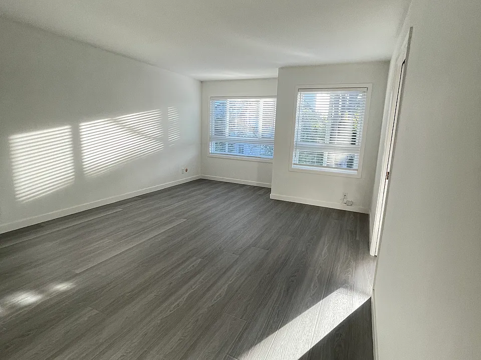 Spacious living area connecting with Remodeled Kitchen