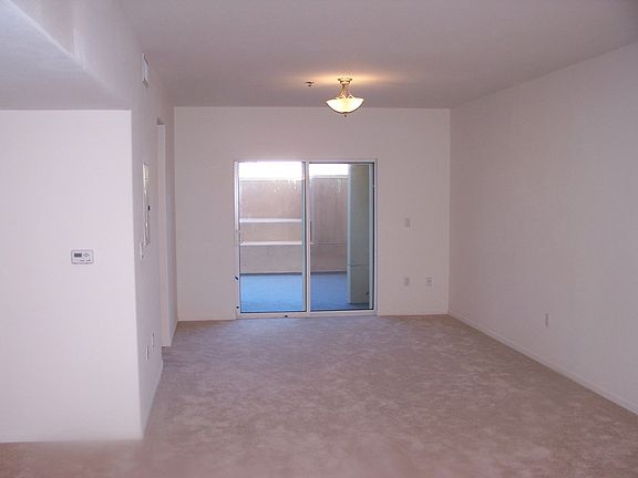 Living Room: Den to the left, Patio view