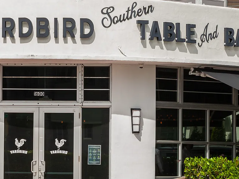 Yardbird Miami Beachs hottest whiskey bar and southern kitchen. This James Beard-nominated restaurant is go-to brunch spot for everyone, and it is only a 6-minute walk away.