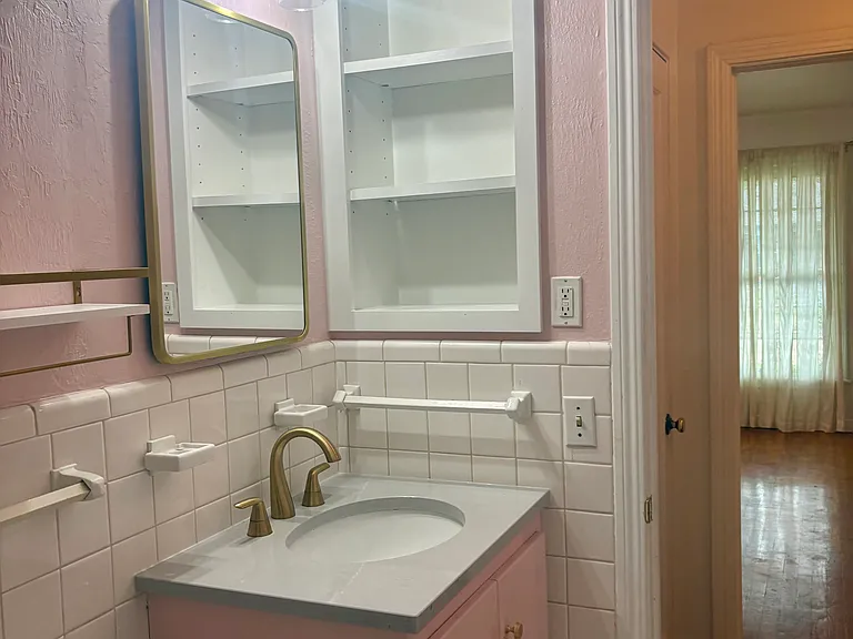 Bathroom with nice storage.
