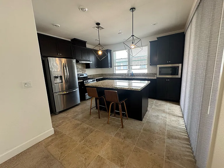 2nd floor kitchen with tile flooring