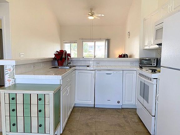 5th image of 75-6081 Alii Dr Unit Cc 203