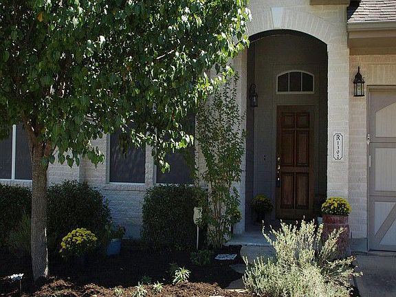 Covered Front Porch and Custom Carriage Style Garage Door!