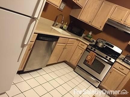 Kitchen
						:
						eat in kitchen (large table + 4 chairs)