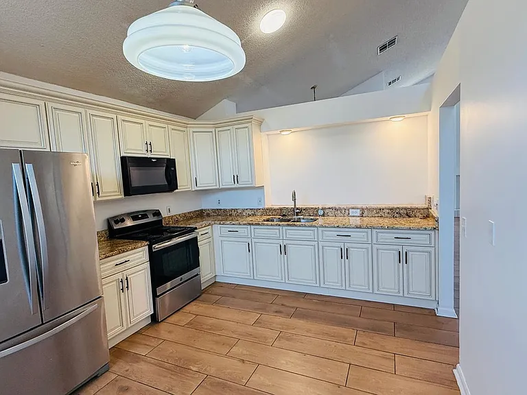 Specious kitchen with appliances. Chef's dream.