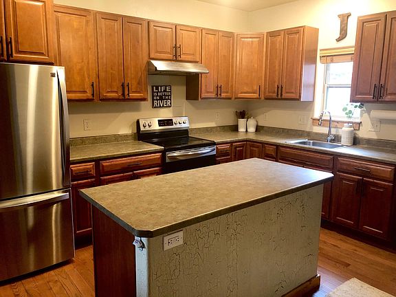 New stainless steel appliances and tons of cabinet storage.