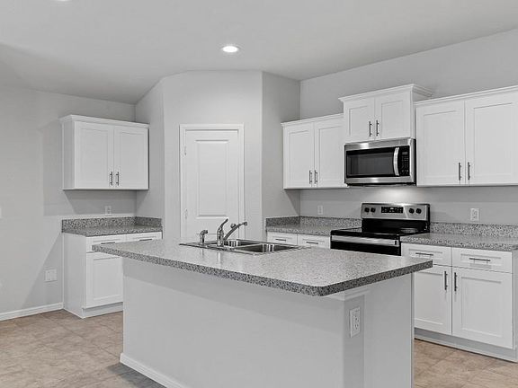 All photos shown here may not depict the specified home & features included are for illustration purposes only.
