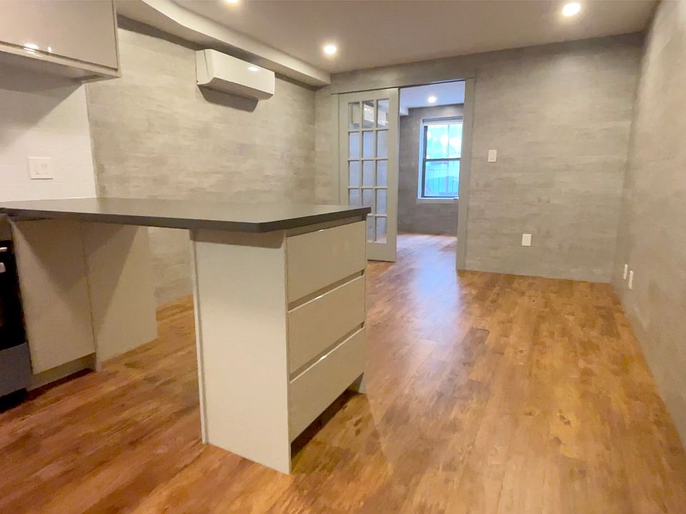 1st image of 102 Mott St APT 1B