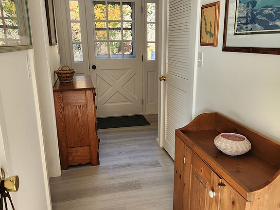 Hall towards front door, kitchen on left
