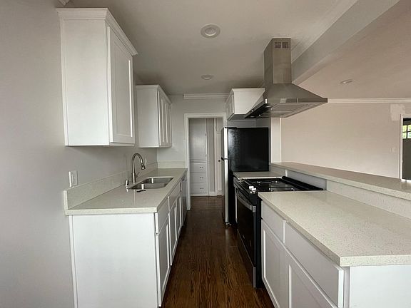 Kitchen with view to hallway