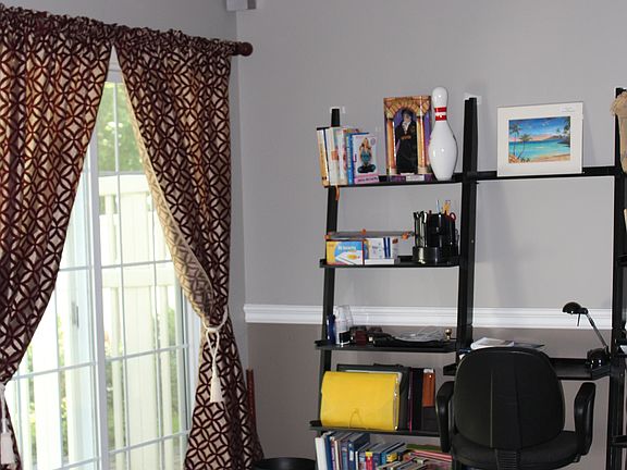 1st floor family room w/sliders to fenced in patio