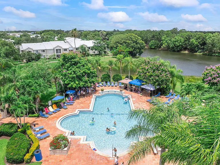 What a view! There's plenty of space for all your friends _ lounge by the pool, soak up the sun, and enjoy every moment.