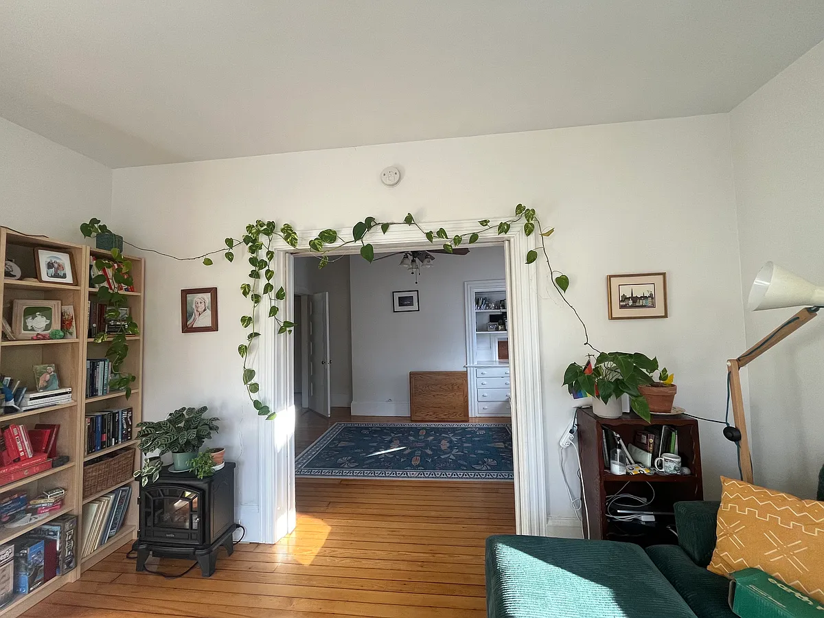 Living room looking into dining room - 76 Carrington Ave