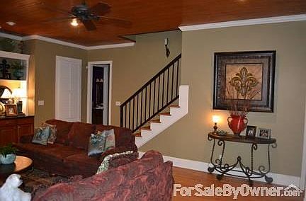 Living Room
						:
						View from front door. 10' Bead board ceilings. Hardwood floors.