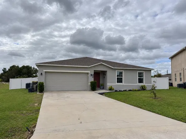 80 ZINNIA LANE E, POINCIANA, FL 34759