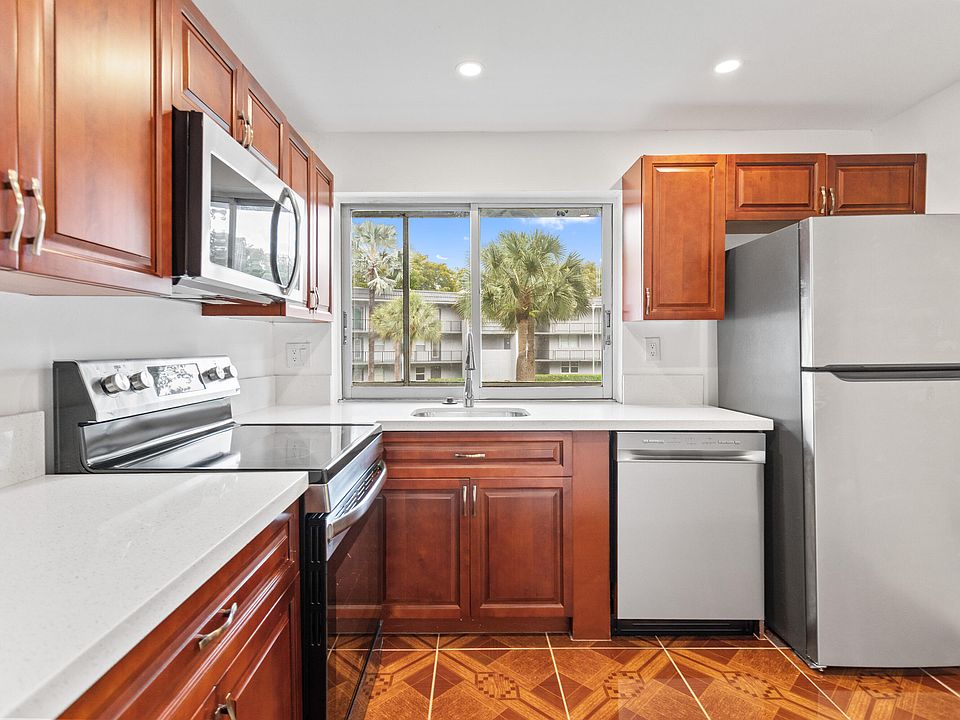 1st image of 9091 Lime Bay Boulevard #210
