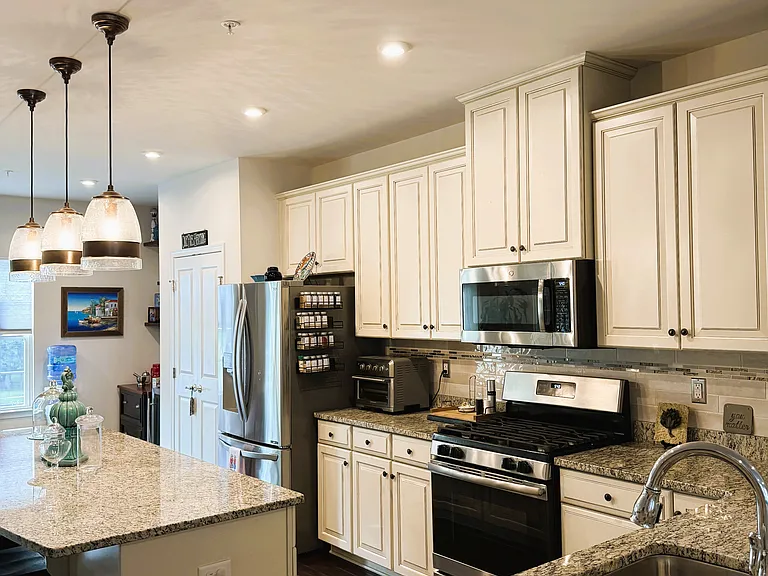 Comfortable kitchen area with stainless steel appliances