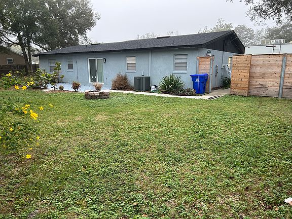 Rear of house and backyard