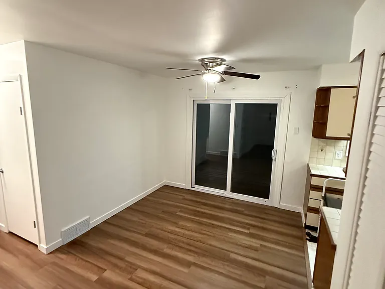 Dinning Room Area With Patio Door to Deck