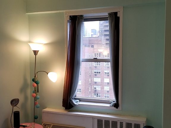 4th image of 30 W 60th St APT 15V