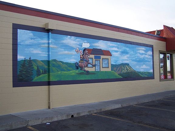 Artisan Local Murals Adorn Building
