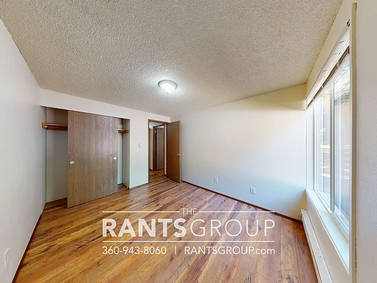 Lovely, wooded 2-bedroom apartment with a large private deck and in-unit washer & dryer! — Photo 44